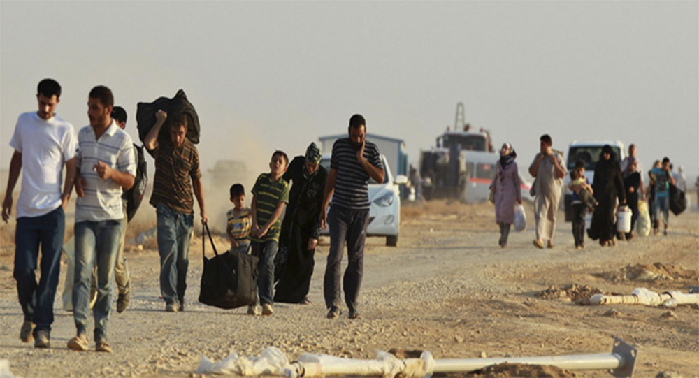 Беженцы из Ракки прибывают в Кания Иса